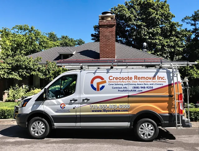 Stow Chimney Sweep technician removing creosote safely in Stow, OH