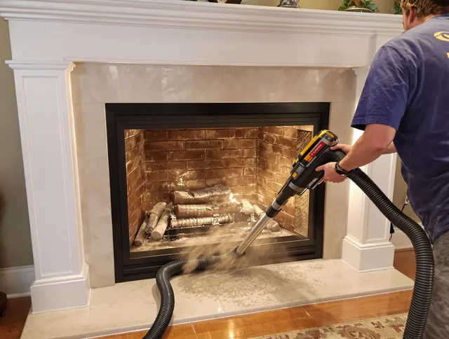 Fireplace cleaning performed by Stow Chimney Sweep in Stow, OH